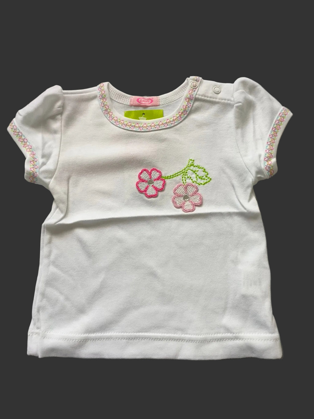 DANY white baby top with pink flower embroidery front view